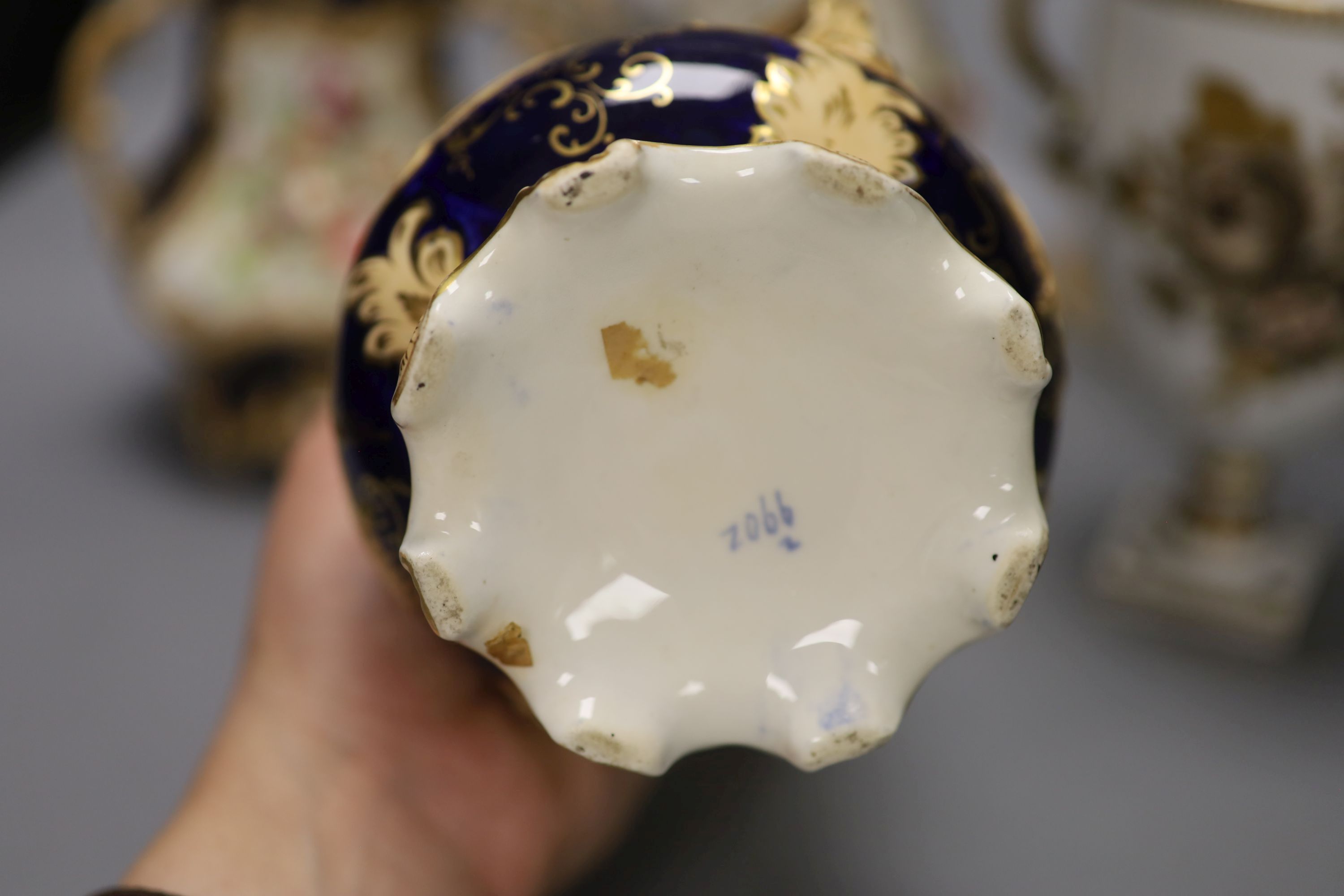A pair of French porcelain vases, a pair Coalbrookdale style vases, a pair of Paris candlesticks and a Meissen Marcolini period vase, t
